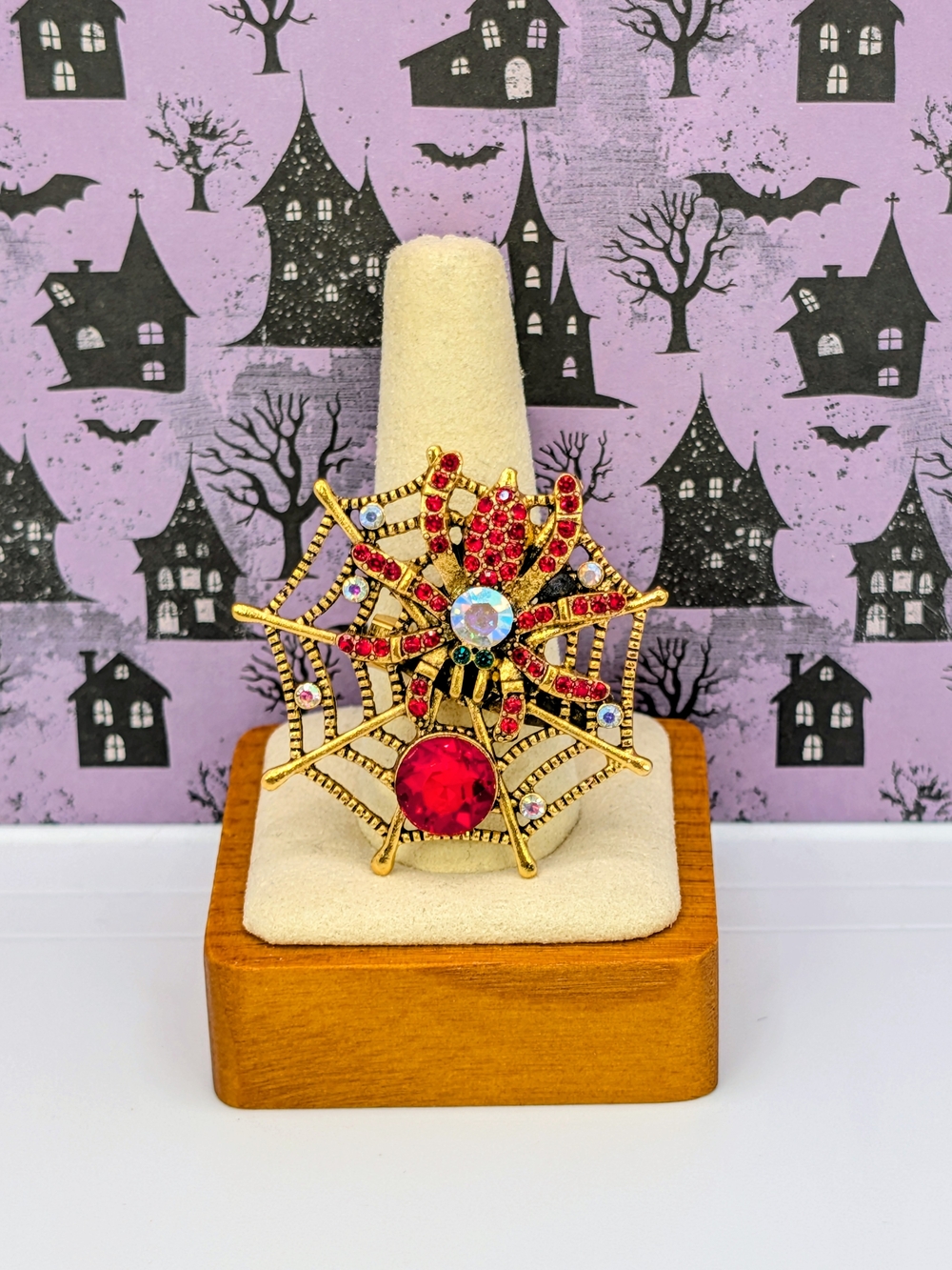 Gold-Tone Spider Web Brooch with Ruby Redfaux Gem And Rhinestones